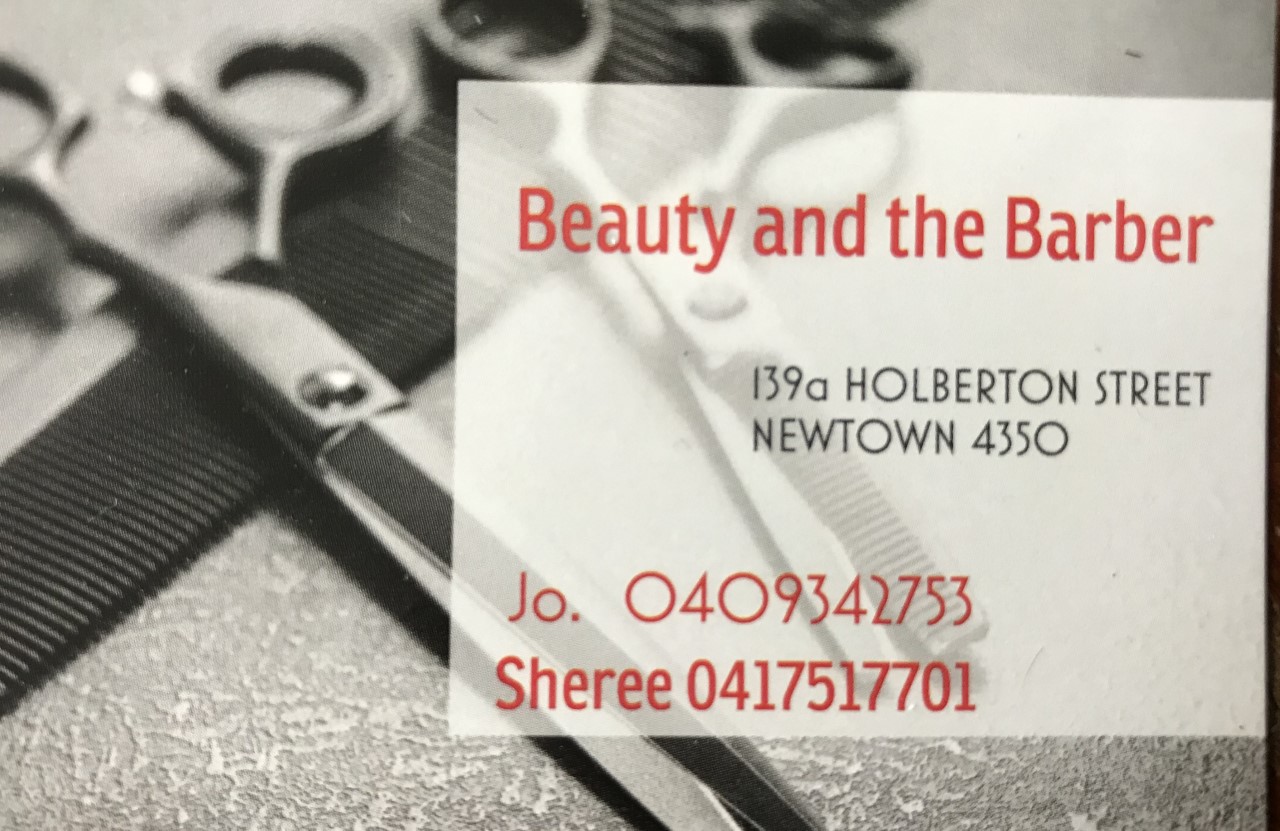 The Beauty and the Barber business card with Jo and Sheree's phone numbers